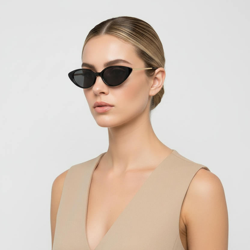 Cat-eye sunglasses with black lenses and gold frames on a white background, branded 'OEC CPO'.